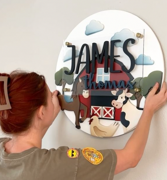 Barnyard Round with James thomas and cow chicken and horse design with clouds and white background on wall