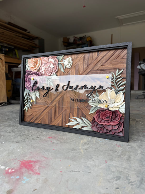Cory & Jasmyn walnut mosaic background with flowers in the corners and double black frame