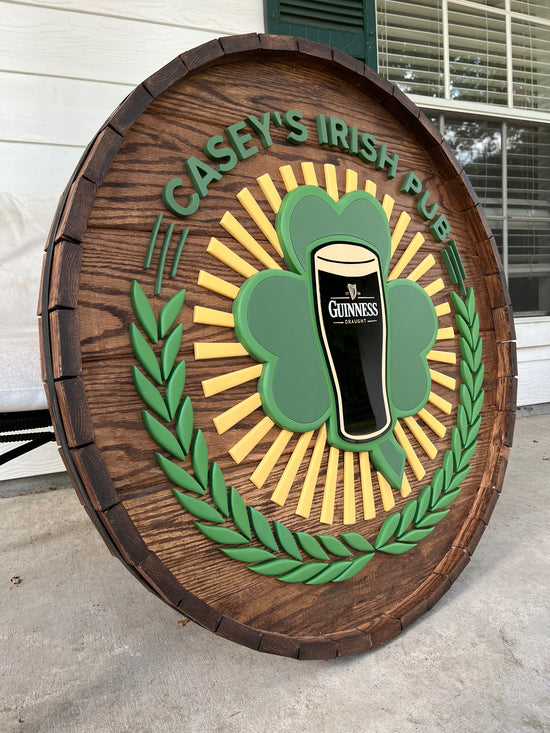 Caseys Irish pub wooden sign with Guiness Mug