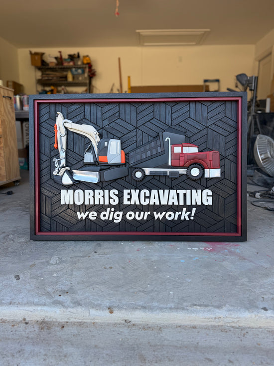 Morris Excavating logo on wood black patterned background with construction trucks in garage