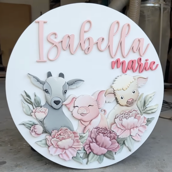 Isabella Marie Round sign with a lamb, sheep, and pig and flowers