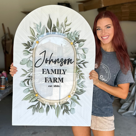 Johnson Family Farm est 1886 arch patterned white background and greenery