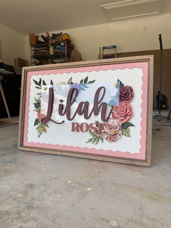 Lilah Rose name with scalloped border and wood frame roses in corners