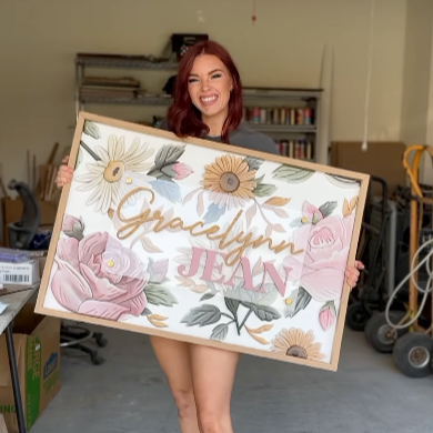 Mixed florals on wood sign with Gracelynn Jean name