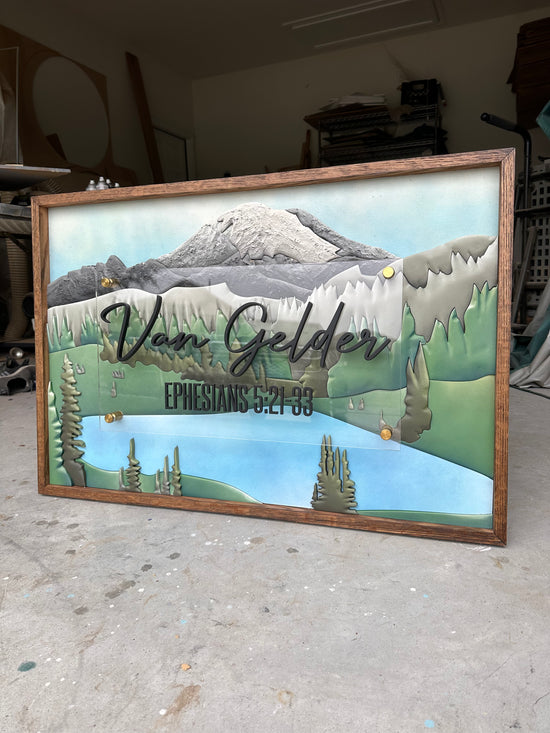 Van Gelder sign with mountain scenery wooden